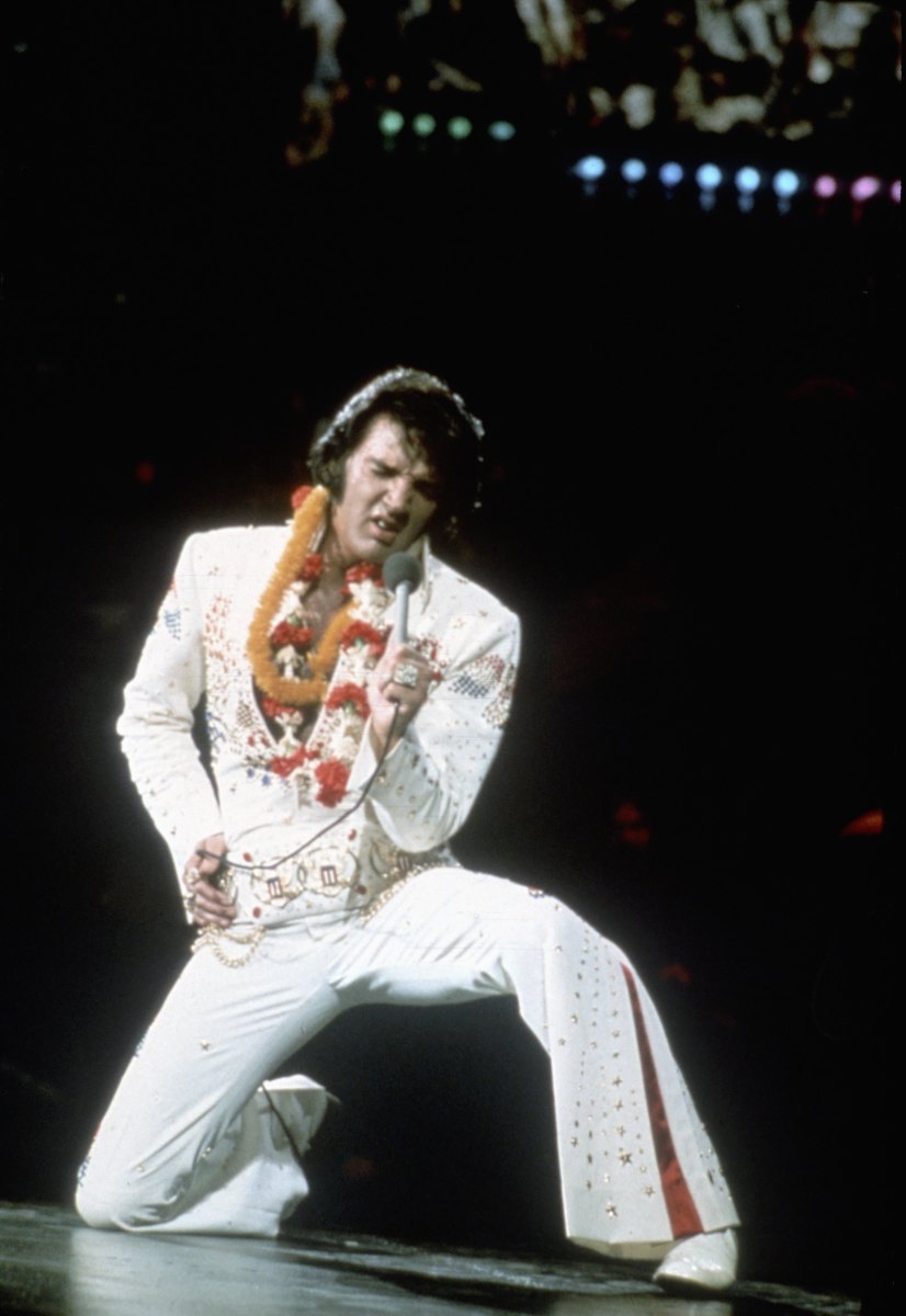 Elvis on one knee